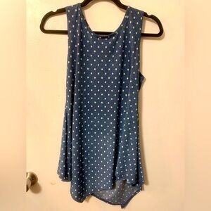 Blue polka dotted, sleeveless blouse